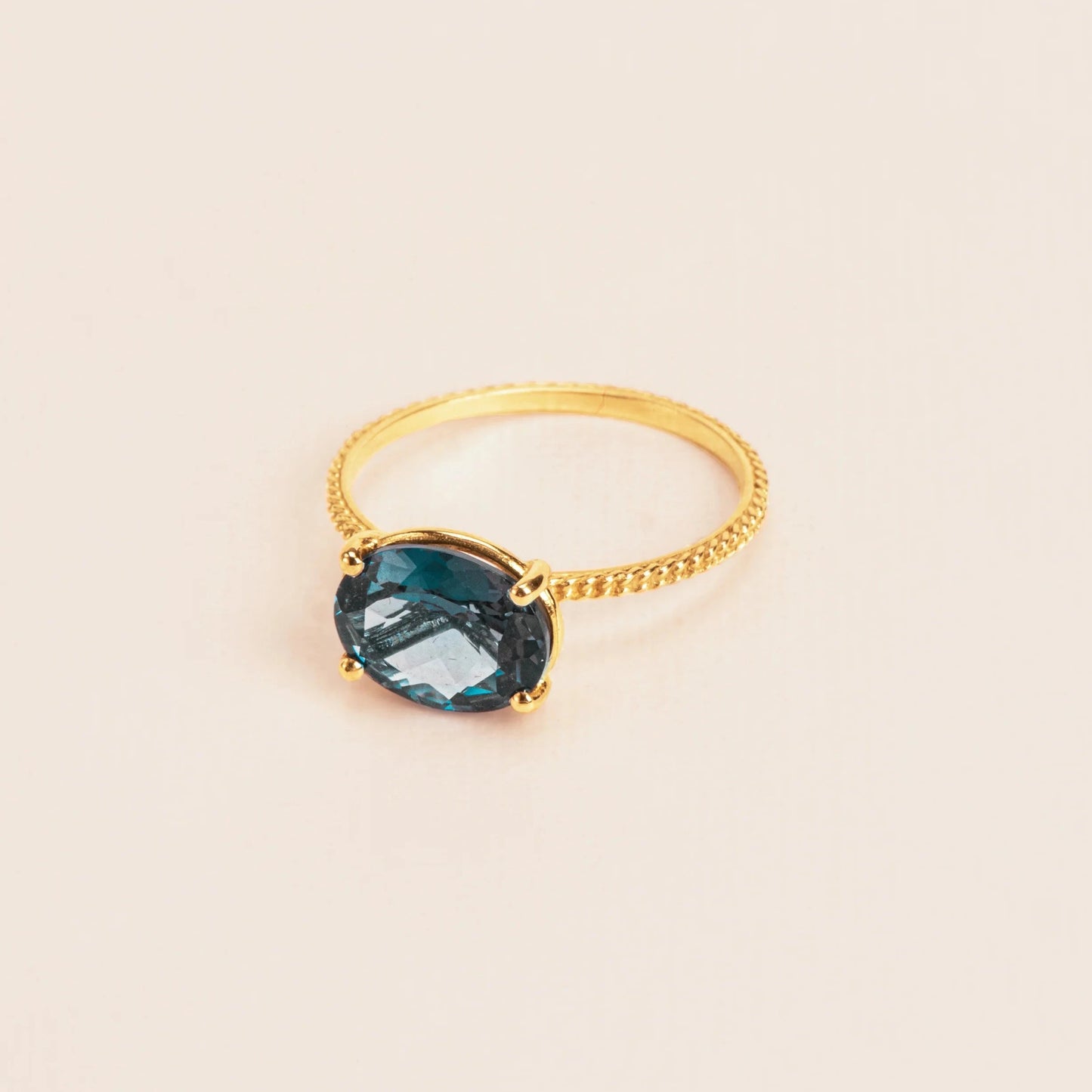 18kt Yellow Gold Textured Ring with Blue Topaz