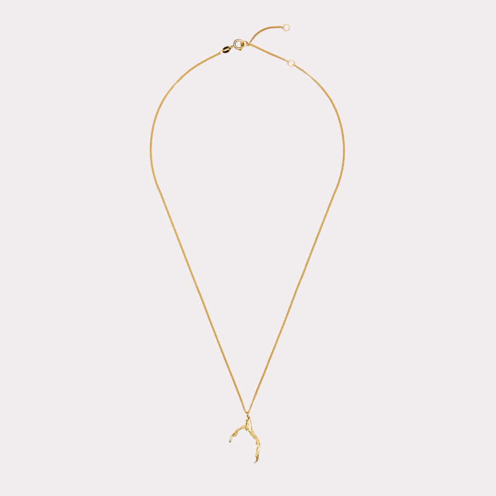 Necklace with signature grigri pendant, 18 ct. gold