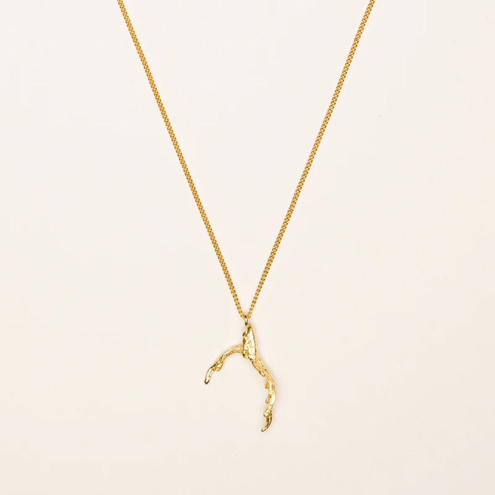 Necklace with signature grigri pendant, 18 ct. gold