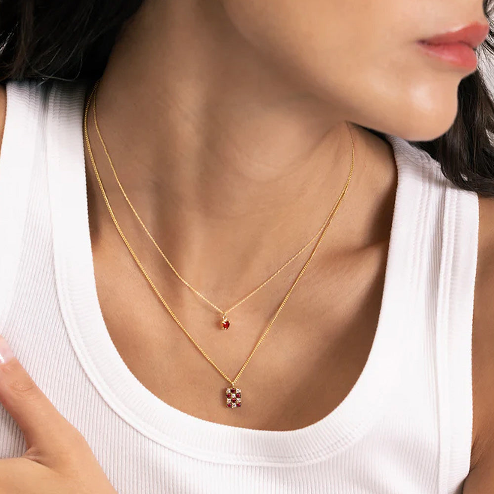 Necklace with ruby and diamond chessboard pendant, 18 ct. gold
